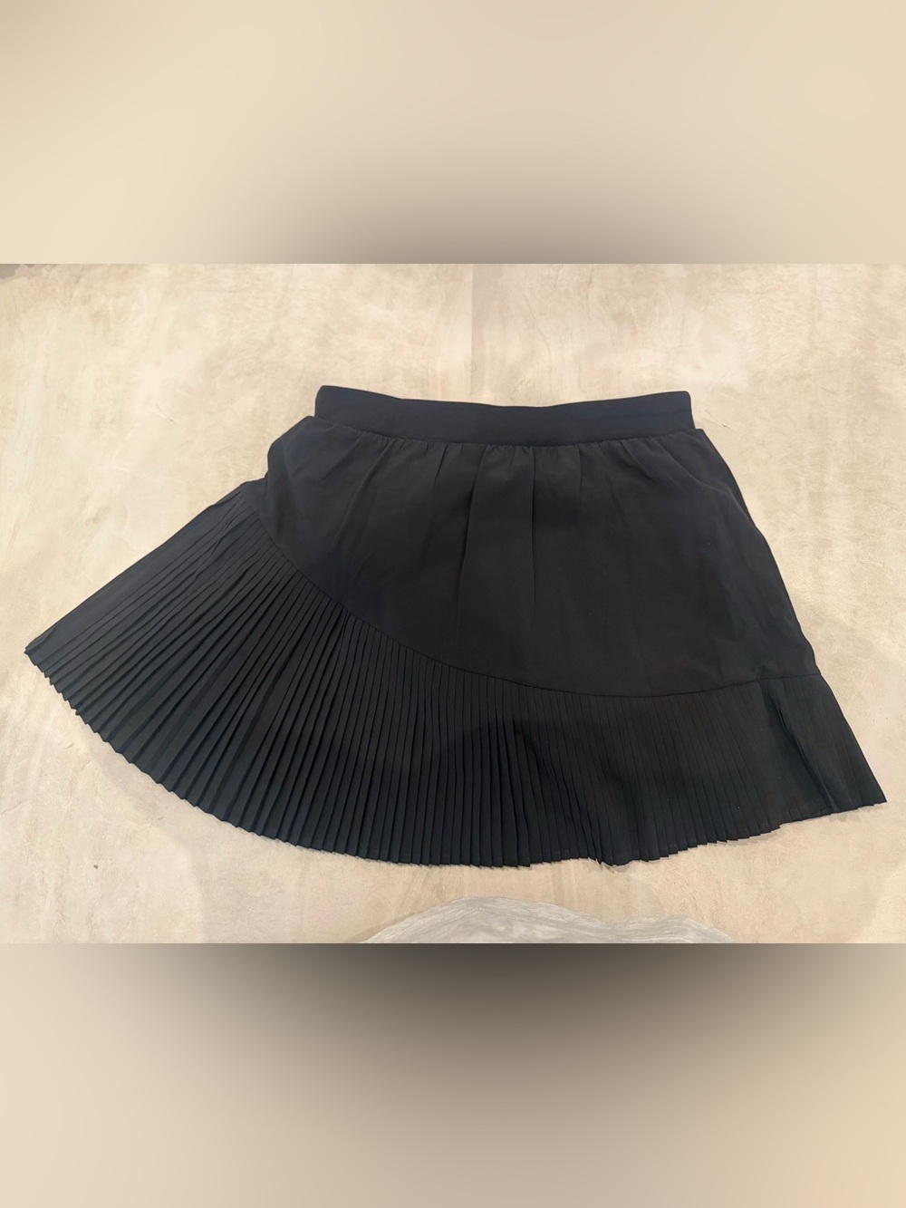 SPANX Black Asymmetrical Pleated Skirt